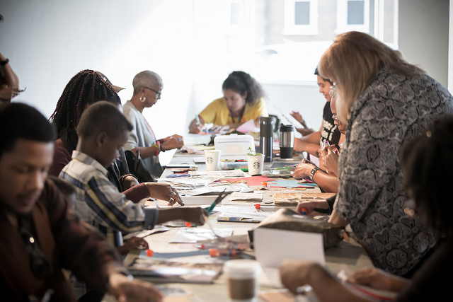 Participants in Andrea Arroyo’s workshop create art that will become part of the Tribute to the Disappeared exhibition. Photo: Melisa Cardona.
