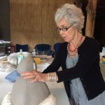 Susan Crowell, ceramics professor at University of Michigan, working on her pollen sculptures during her Azule residency.